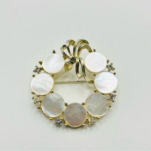 Vintage signed Lisner Mother of Pearl and clear rhinestone wreath brooch